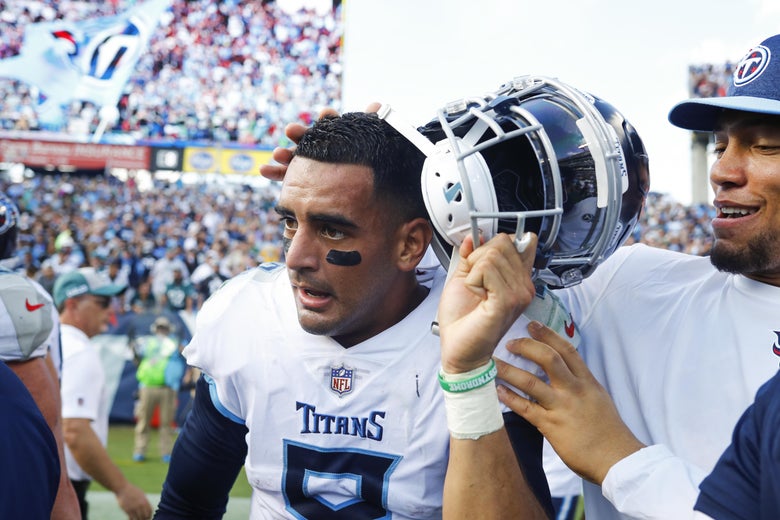 NASHVILLE, TN - SEPTEMBER 30: Marcus Mariota #8 of the Tennessee Titans is congratulated as he removes his helmet after defeating the Philadelphia Eagles 26-23 in overtime at Nissan Stadium on September 30, 2018 in Nashville, Tennessee. (Photo by Wesley Hitt/Getty Images)